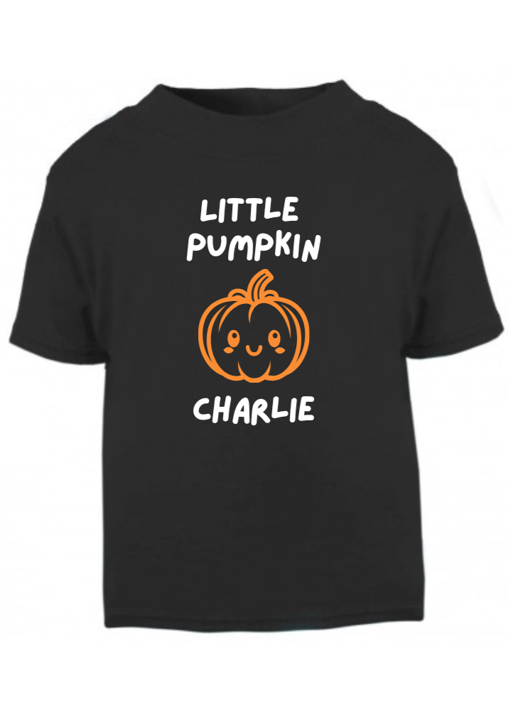 Black t-shirt with a pumpkin graphic and text on a white background