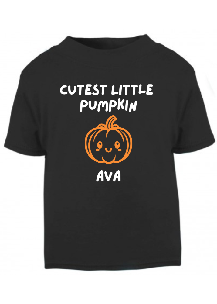 Black t-shirt with 'Cutest Little Pumpkin Ava' design on a white background