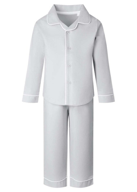 A pair of white pajamas with long sleeves and button closure, displayed against a plain background.