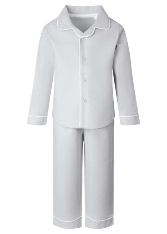 A pair of white pajamas with long sleeves and button closure, displayed against a plain background.