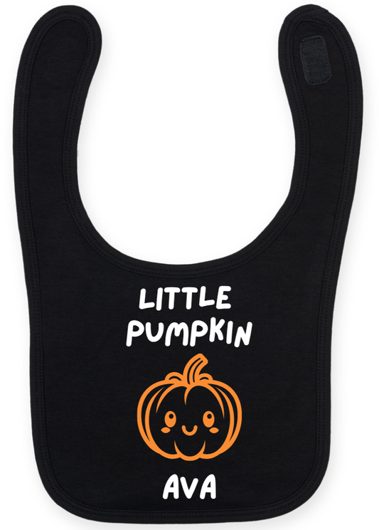 Black bib with 'Little Pumpkin Ava' text and pumpkin graphic on a white background